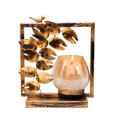 Elegant piece of art with a humming bird on top and stem of leaves with a glass candle holder