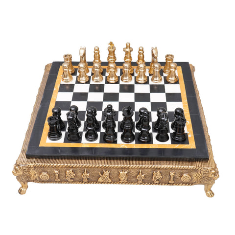 Chess game with marble finish on top and gold frame
