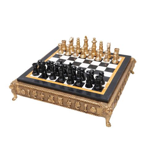 Chess game with marble finish on top and gold frame